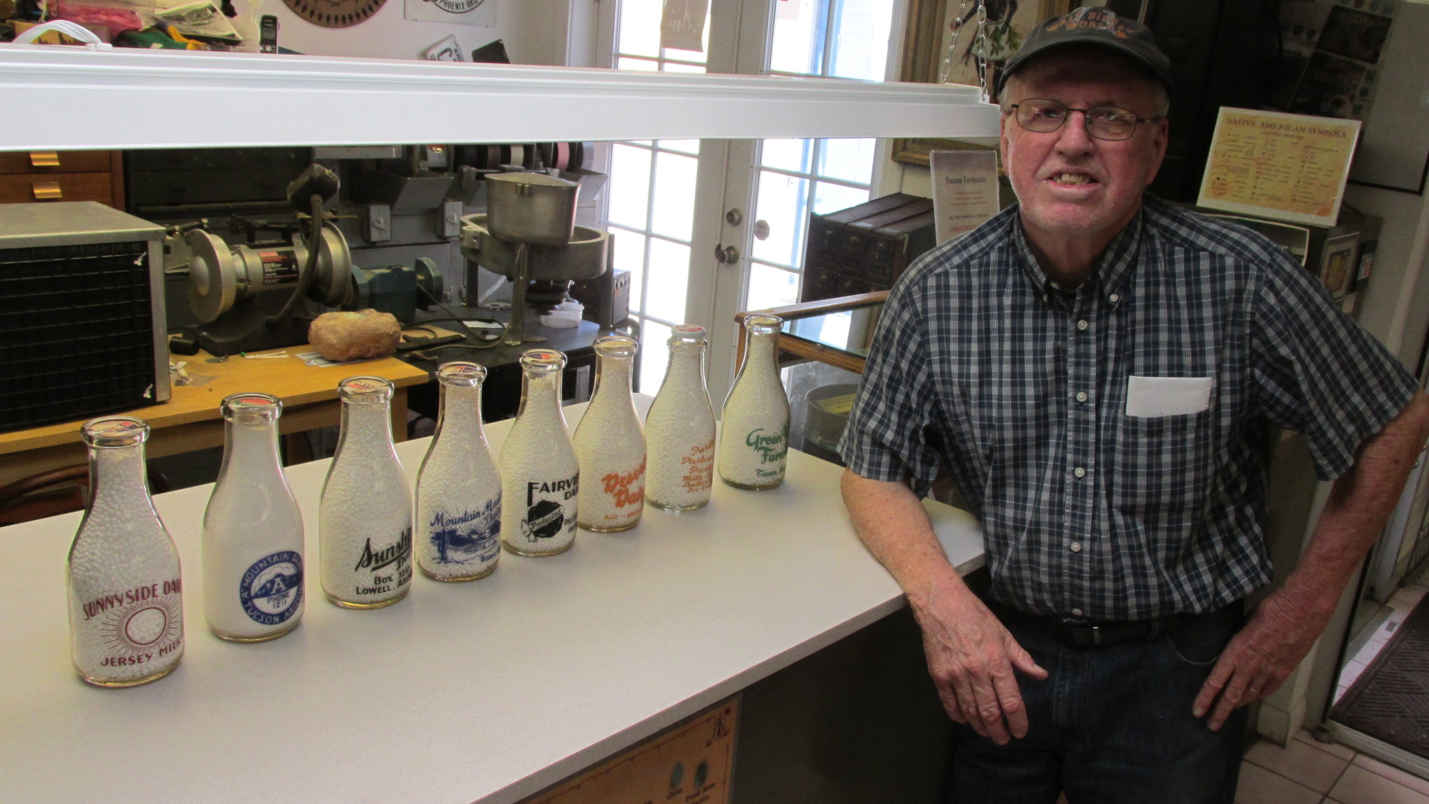 Hillard Frey with his world class vintage Tucson milk bottle collection